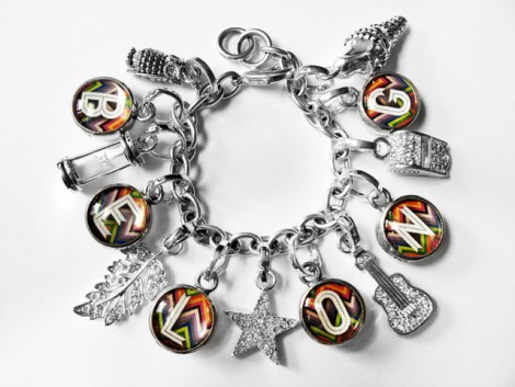 Pick Up Sticks charms on a charm bracelet